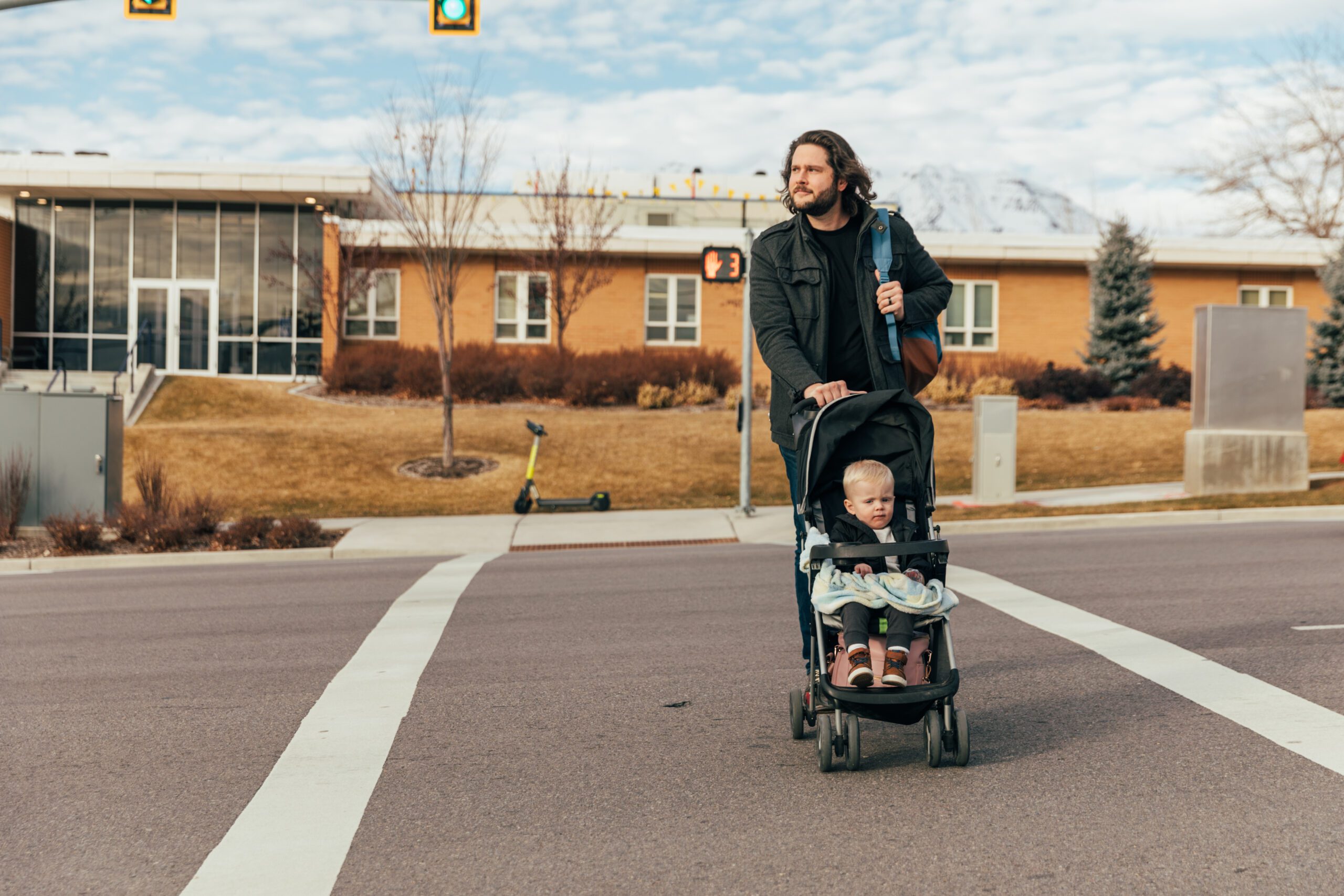 Student father with child on college campus