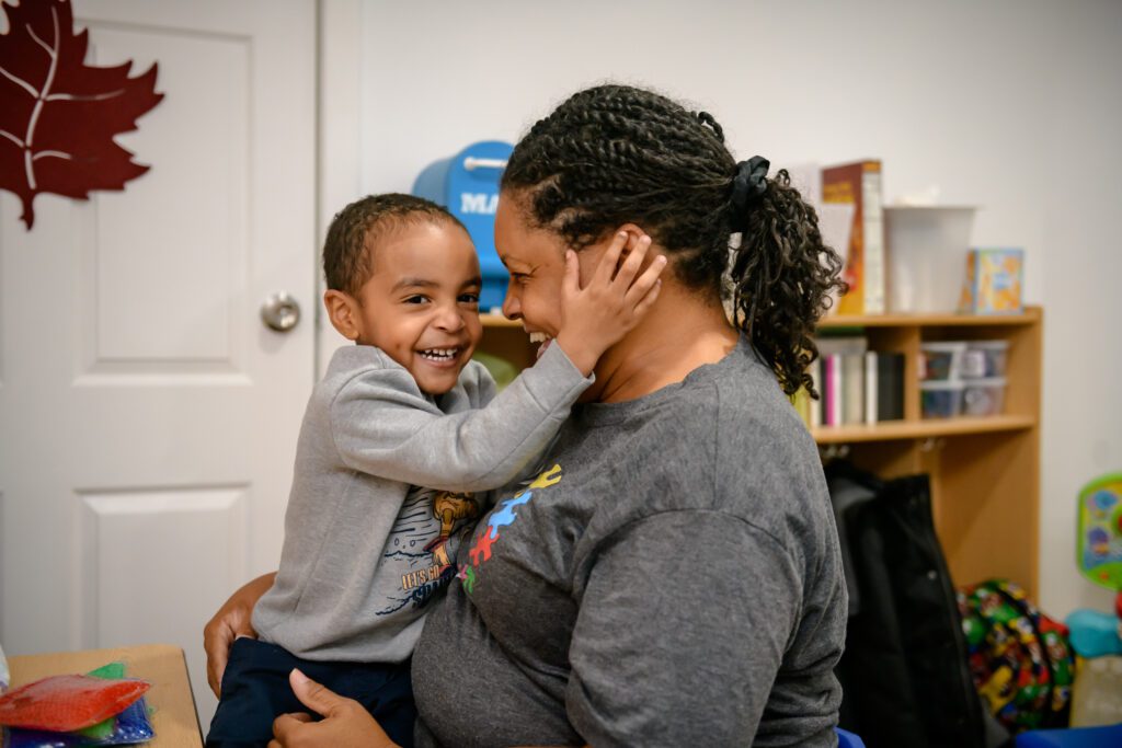 Mother holding her son