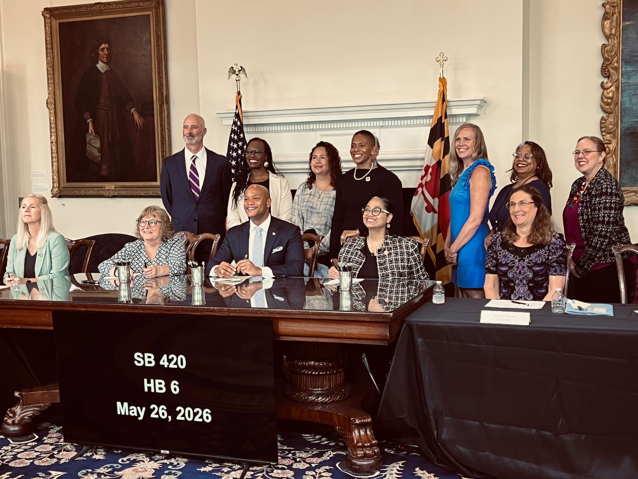 Student parent advocates with MD Gov. Wes Moore at the bill signing for the student parent data collection bill.